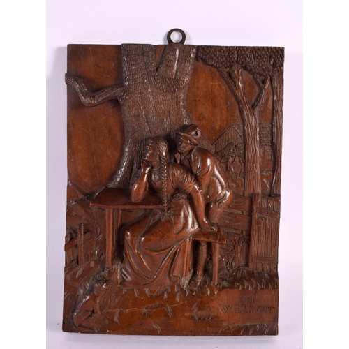 587 - AN ANTIQUE BAVARIAN BLACK FOREST CARVED WOOD PLAQUE. 24 cm x 18 cm.