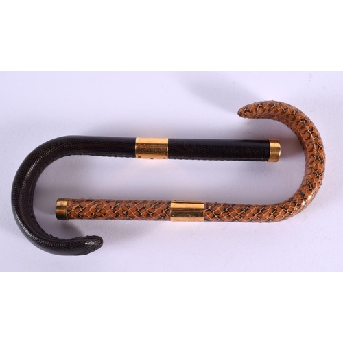 588 - TWO VINTAGE SNAKESKIN CANE HANDLES. 18 cm long. (2)