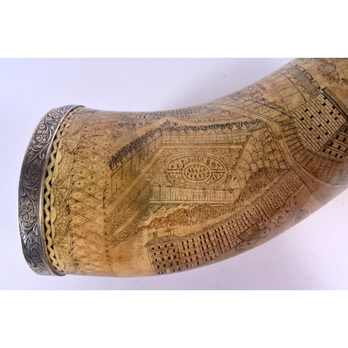 593 - A PAIR OF EARLY 19TH CENTURY CARVED SCRIMSHAW HORN FLASKS decorated all over with buildings and anim... 