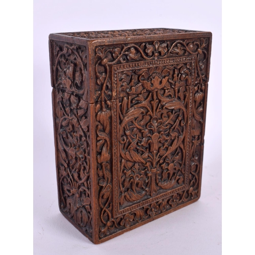 596 - A 19TH CENTURY ANGLO INDIAN CARVED WOOD BOX AND COVER decorated with foliage. 14 cm x 10 cm.