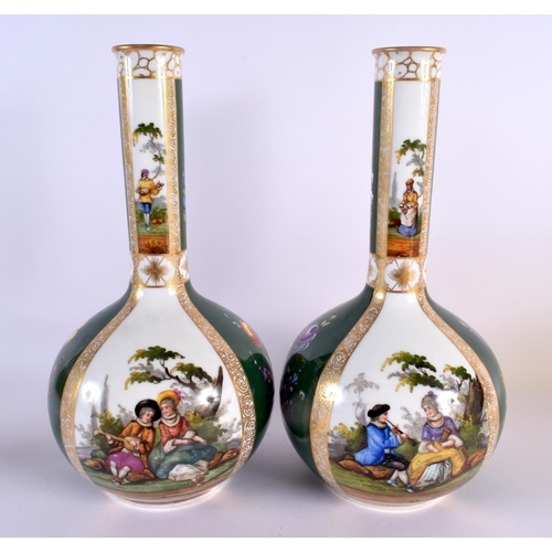 601 - A LARGE PAIR OF 19TH CENTURY AUGUSTUS REX PORCELAIN VASES painted with lovers in landscapes. 32 cm x... 