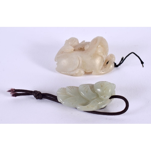 617 - TWO 19TH CENTURY CHINESE CARVED JADE PENDANTS Qing. Largest 4.5 cm x 3.5 cm. (2)