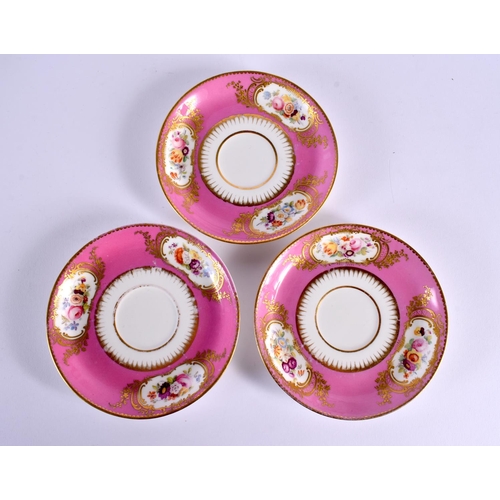 62 - A 19TH CENTURY ENGLISH PORCELAIN PINK GROUND DESSERT SERVICE painted with flowers and vines. Largest... 