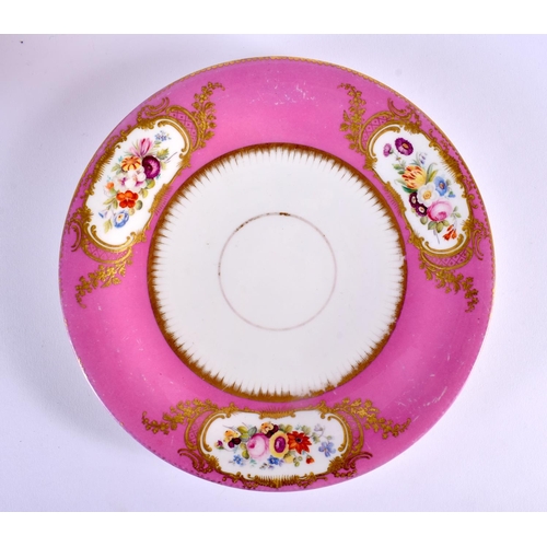 62 - A 19TH CENTURY ENGLISH PORCELAIN PINK GROUND DESSERT SERVICE painted with flowers and vines. Largest... 