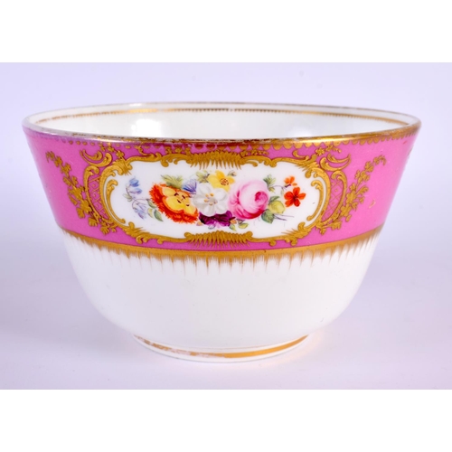 62 - A 19TH CENTURY ENGLISH PORCELAIN PINK GROUND DESSERT SERVICE painted with flowers and vines. Largest... 