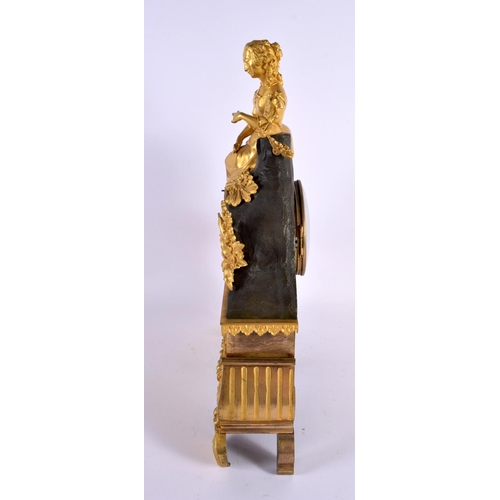 636 - A 19TH CENTURY FRENCH GILT BRONZE MANTEL CLOCK formed with a figure. 40 cm x 22 cm.