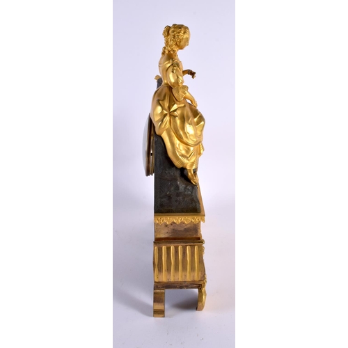 636 - A 19TH CENTURY FRENCH GILT BRONZE MANTEL CLOCK formed with a figure. 40 cm x 22 cm.