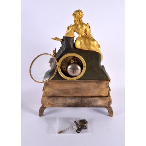 636 - A 19TH CENTURY FRENCH GILT BRONZE MANTEL CLOCK formed with a figure. 40 cm x 22 cm.