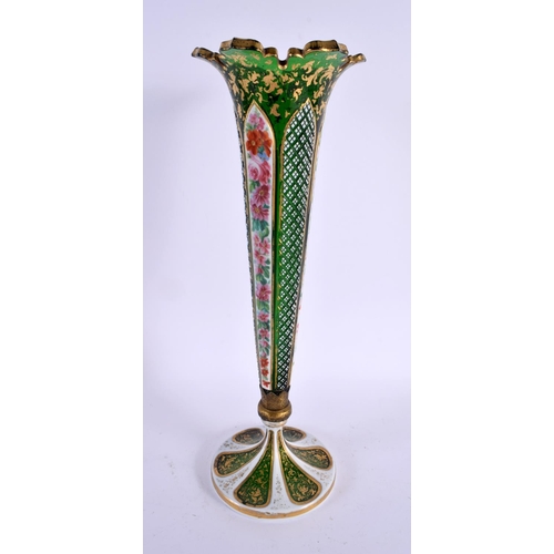 667 - A LARGE ANTIQUE BOHEMIAN ENAMELLED GLASS VASE painted with flowers. 36 cm high.