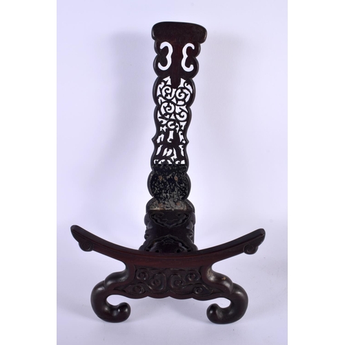 668 - A LARGE PAIR OF 19TH CENTURY CHINESE CARVED HARDWOOD DISPLAY STANDS Qing. 35 cm x 18 cm.