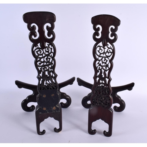 668 - A LARGE PAIR OF 19TH CENTURY CHINESE CARVED HARDWOOD DISPLAY STANDS Qing. 35 cm x 18 cm.