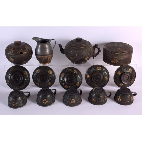 669 - A RARE 19TH CENTURY CHINESE CARVED COCONUT AND PEWTER TEASET Qing. Largest 20 cm wide. (qty)