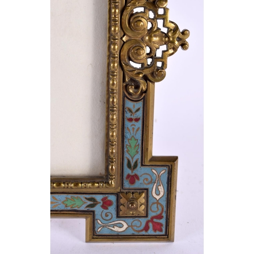 678 - A 19TH CENTURY FRENCH CHAMPLEVE ENAMEL PHOTOGRAPH FRAME decorated with foliage. 24 cm x 16 cm.