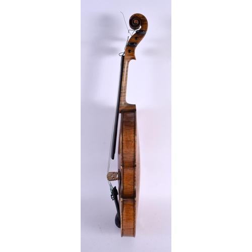 684 - AN ANTIQUE SINGLE PIECE BACK VIOLIN with bow. Violin 58 cm long, length of back 36 cm. (2)