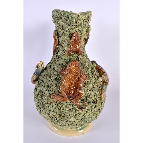 69 - A LARGE ANTIQUE PORTUGUESE MAJOLICA PALISSY TYPE JUG overlaid with frogs and lizards. 30 cm x 18 cm.