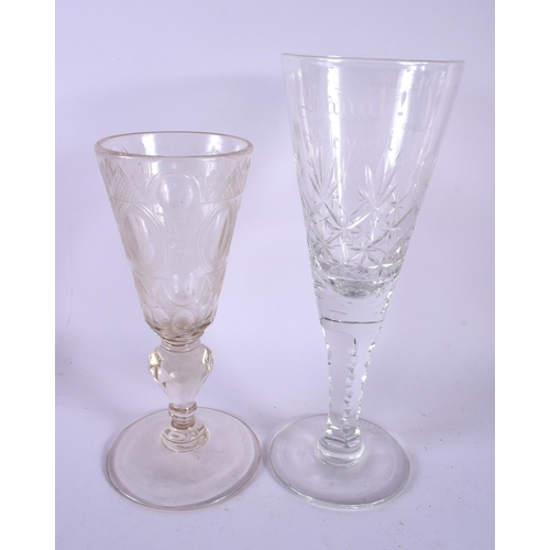 690 - TWO LARGE ANTIQUE GLASSES. Largest 28 cm high. (2)