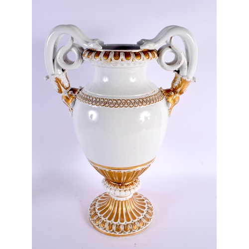 698 - A LARGE 19TH CENTURY MEISSEN TWIN HANDLED PORCELAIN VASE with serpent mounts. 47 cm x 30 cm.