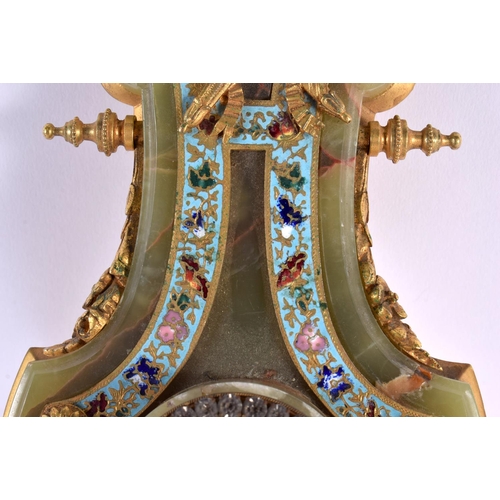 709 - A FINE LATE 19TH CENTURY FRENCH ONYX ORMOLU AND CHAMPLEVE ENAMEL MANTEL CLOCK decorated with foliage... 