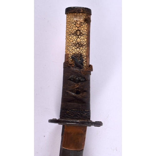 721 - A 19TH CENTURY JAPANESE MEIJI PERIOD SHAGREEN HANDLED WAKAZASHI SWORD with iron mounts. 57 cm long.