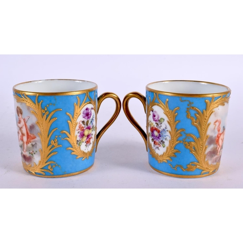 722 - A PAIR OF LATE 19TH CENTURY FRENCH SEVRES PORCELAIN CUPS AND SAUCERS painted with putti. 10.5 cm dia... 