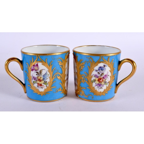 722 - A PAIR OF LATE 19TH CENTURY FRENCH SEVRES PORCELAIN CUPS AND SAUCERS painted with putti. 10.5 cm dia... 