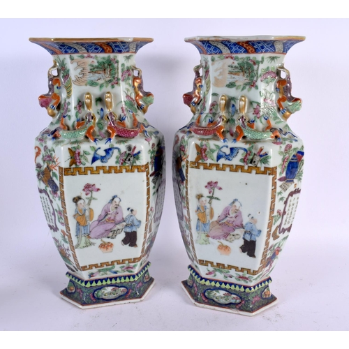 724 - A LARGE PAIR OF 19TH CENTURY CHINESE CANTON FAMILLE ROSE VASES Qing. 30 cm x 14 cm.