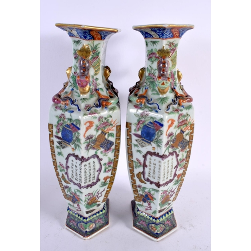 724 - A LARGE PAIR OF 19TH CENTURY CHINESE CANTON FAMILLE ROSE VASES Qing. 30 cm x 14 cm.