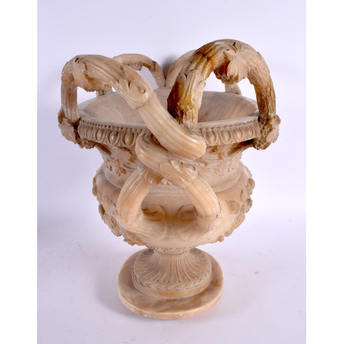 735 - A LARGE 19TH CENTURY ITALIAN GRAND TOUR CARVED ALABASTER URN decorated with mask heads and flowers. ... 