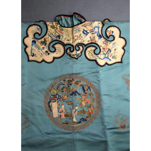 741 - A FINE 19TH CENTURY CHINESE GREEN SILK EMBROIDERED JACKET Qing, decorated with eight roundels and fi... 