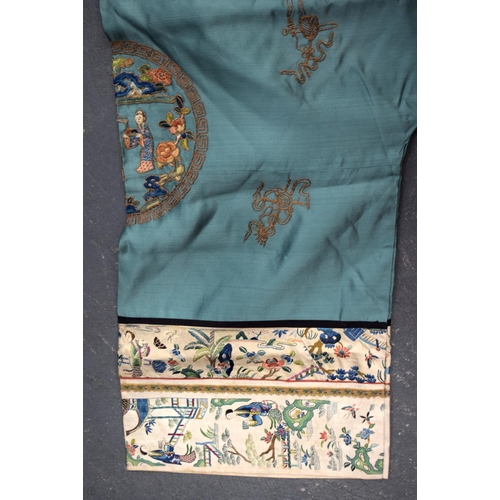 741 - A FINE 19TH CENTURY CHINESE GREEN SILK EMBROIDERED JACKET Qing, decorated with eight roundels and fi... 