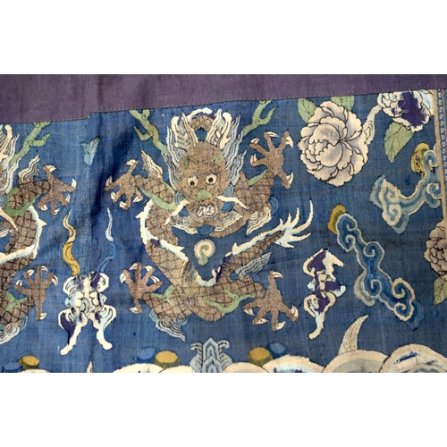 742 - A LARGE 18TH CENTURY CHINESE EMBROIDERED KESI SILK DRAGON PANEL Qianlong. 182 cm x 75 cm.