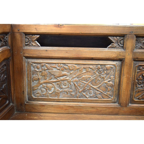 751 - A LARGE EARLY 20TH CENTURY CHINESE CARVED HARDWOOD BENCH Late Qing/Republic. 182 cm x 90 cm x 60 cm.