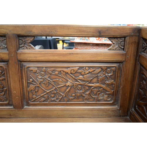 751 - A LARGE EARLY 20TH CENTURY CHINESE CARVED HARDWOOD BENCH Late Qing/Republic. 182 cm x 90 cm x 60 cm.