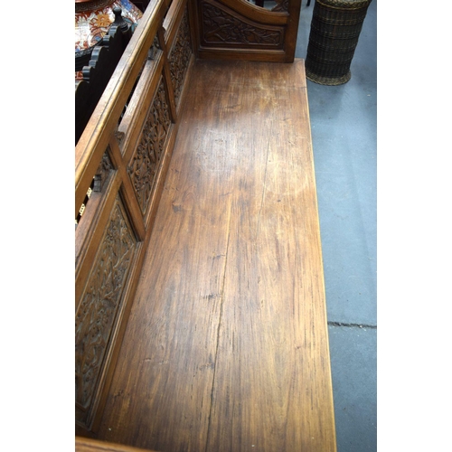 751 - A LARGE EARLY 20TH CENTURY CHINESE CARVED HARDWOOD BENCH Late Qing/Republic. 182 cm x 90 cm x 60 cm.