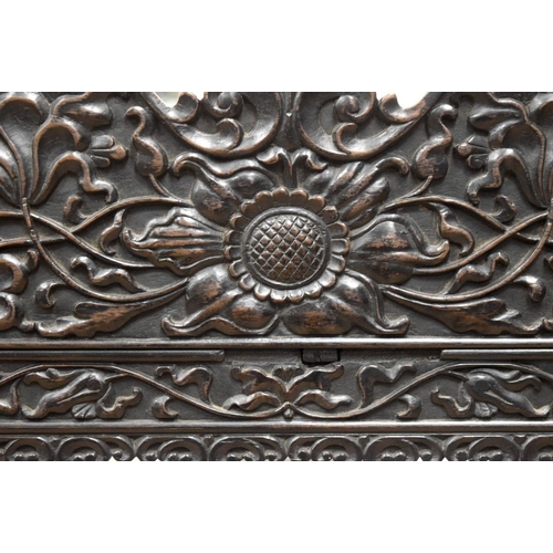 752 - A FINE EARLY 19TH CENTURY ANGLO INDIAN CARVED HARDWOOD SETTEE decorated with foliage and extensive v... 