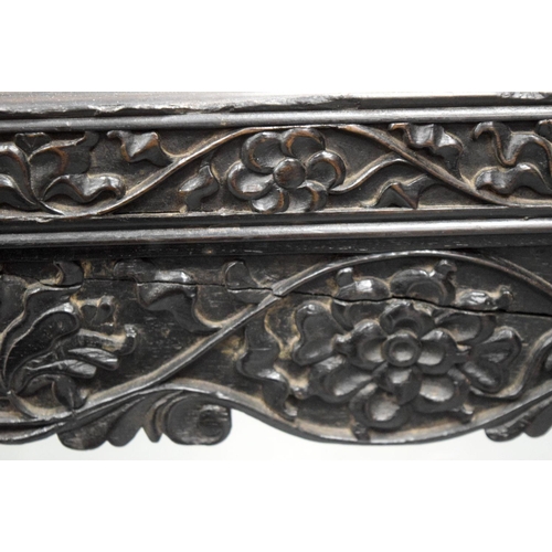 752 - A FINE EARLY 19TH CENTURY ANGLO INDIAN CARVED HARDWOOD SETTEE decorated with foliage and extensive v... 