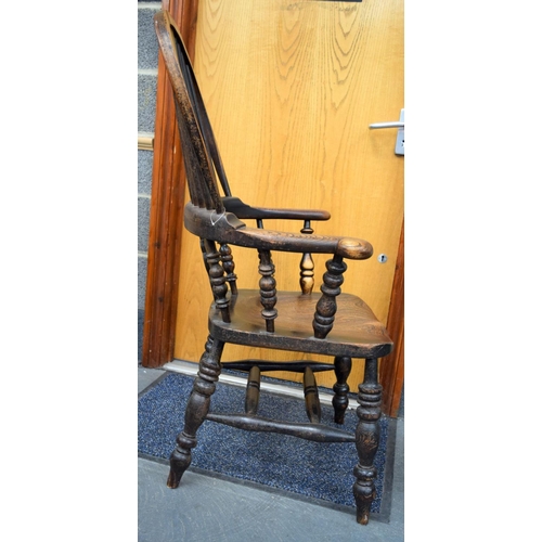 756 - AN ANTIQUE COUNTRY ELM WINDSOR CHAIR. 110 cm x 60 cm.