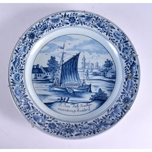 775 - THREE LARGE DELFT BLUE AND WHITE PORCELAIN PLATES. 32 cm diameter. (3)