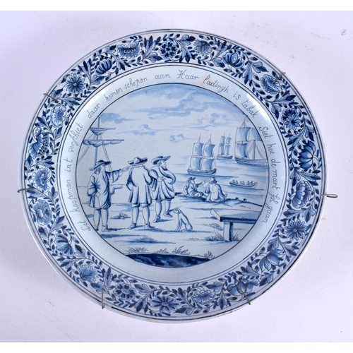 775 - THREE LARGE DELFT BLUE AND WHITE PORCELAIN PLATES. 32 cm diameter. (3)