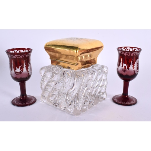 78 - A LARGE VICTORIAN YELLOW METAL COUNTRY HOUSE GLASS INKWELL together with a pair of Bohemian goblets.... 