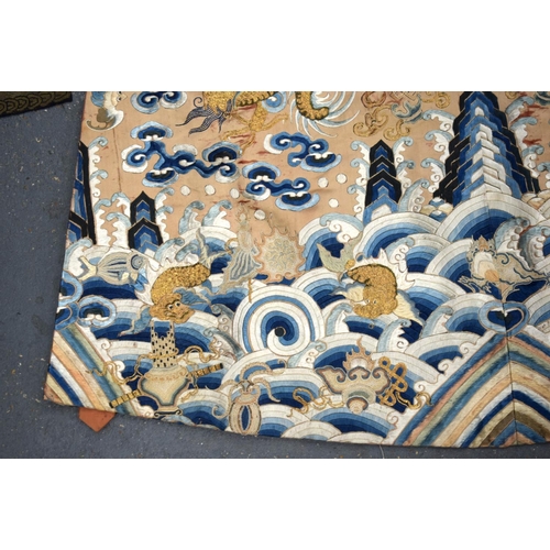 783 - A LARGE 19TH CENTURY CHINESE ORANGE SILK WORK EMBROIDERED DRAGON ROBE together with a rank badge and... 