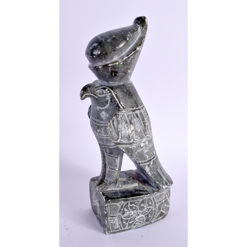 797 - AN EGYPTIAN REVIVAL CARVED STONE FIGURE OF HORUS. 21 cm high.