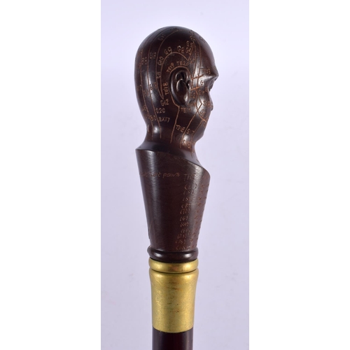 807 - A PHRENOLOGY HEAD WALKING CANE. 90 cm long.