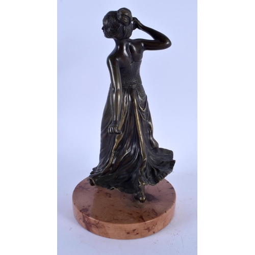 815 - A 19TH CENTURY AUSTRIAN BRONZE FIGURE OF A STANDING DANCER modelled upon a marble base. 23 cm high.