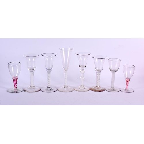 819 - EIGHT ANTIQUE SPIRAL TWIST WINE GLASSES. Largest 20 cm high. (8)