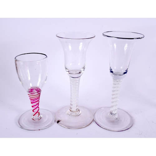 819 - EIGHT ANTIQUE SPIRAL TWIST WINE GLASSES. Largest 20 cm high. (8)