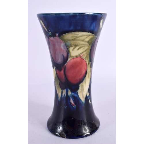 83 - A MOORCROFT VASE. 15 cm high.