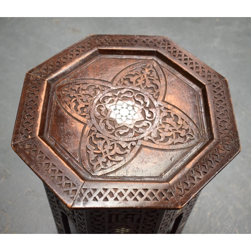 832 - AN ANTIQUE MIDDLE EASTERN MOORISH LIBERTY TYPE TABLE depicting a central mother of pearl star. 40 cm... 