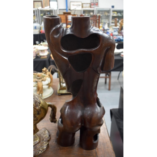 834 - A LARGE CARVED SCULPTURE OF A FEMALE TORSO. 72 cm x 22 cm.