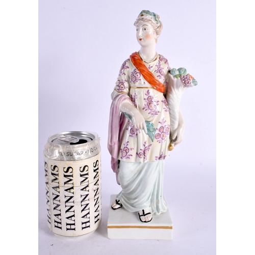 84 - A LARGE 18TH CENTURY ENGLISH PORCELAIN FIGURE OF A FEMALE modelled holding flowers. 26 cm high.